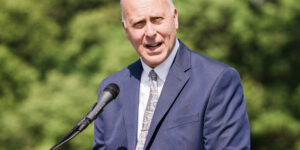 Lynnfield High School principal Robert Cleary delivers a speech during the school's drive-through graduation on Friday.