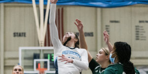 Peabody's Logan Lomasney goes up with the ball.